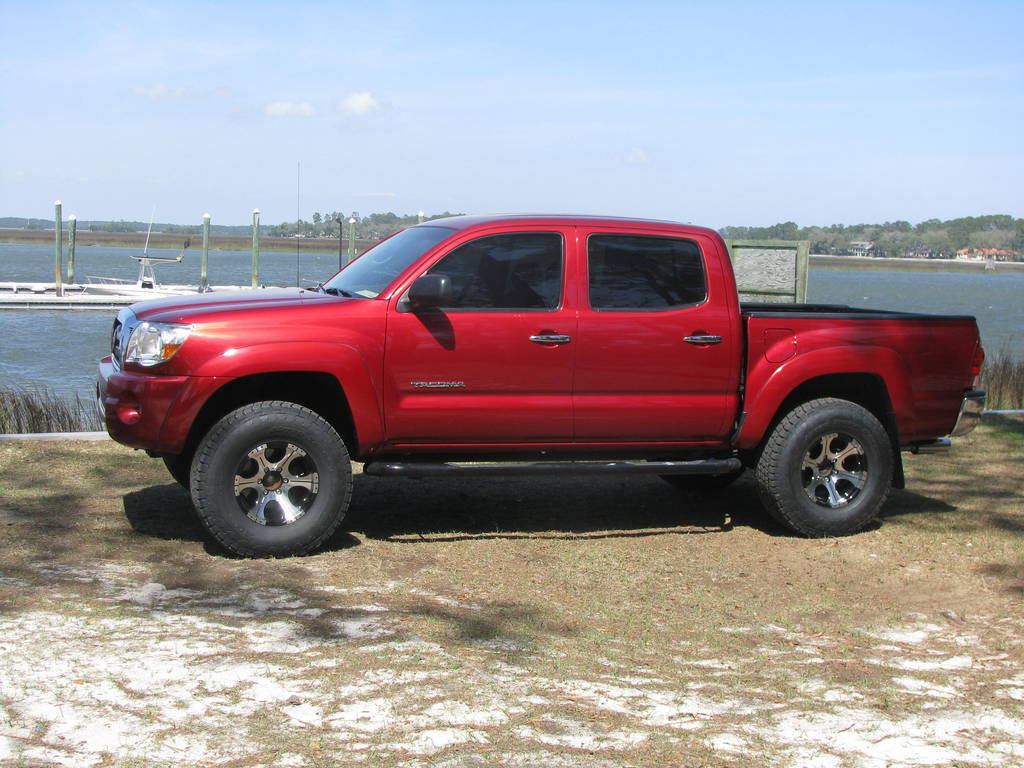 Red Tacoma Lifted