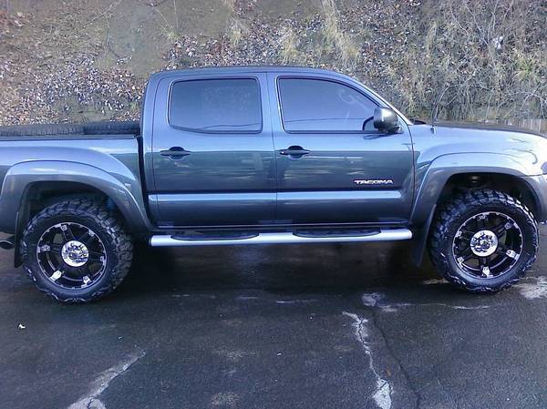 toyota tacoma 4x4 lifted. i went body lift man.