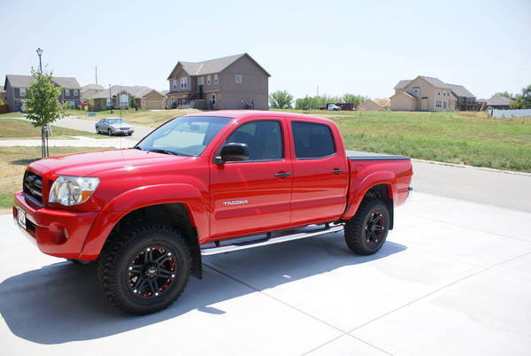 red toyota tacoma with black rims #3