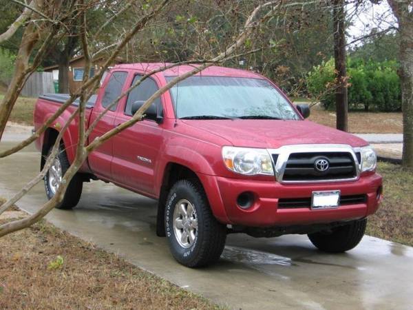  pics of my truck with the new 265/75/16 Firestone Destination A/T's..