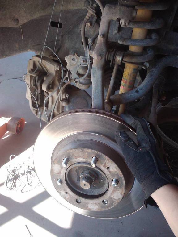 2003 nissan frontier front wheel bearing replacement