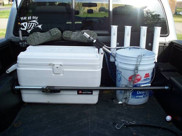 Trailer hitch fishing rod holder