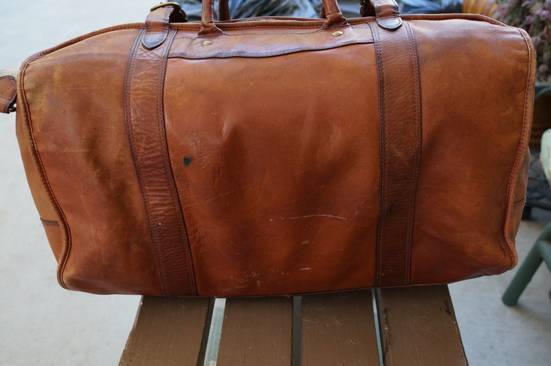 tumi leather duffle bag