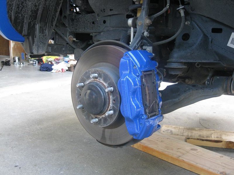 Blue Brake Caliper (Taco_Caliper_Wheel_Off.jpg) World