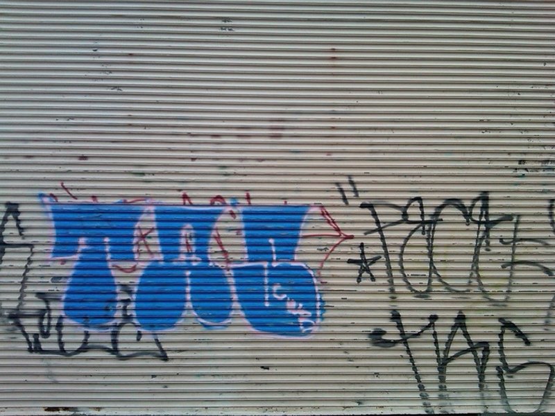 Roll top door to me work got some fresh tags by some POS scumbags.